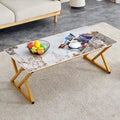 Table basse rectangulaire moderne 47 avec plateau en pierre frittée et pieds en métal en forme de X