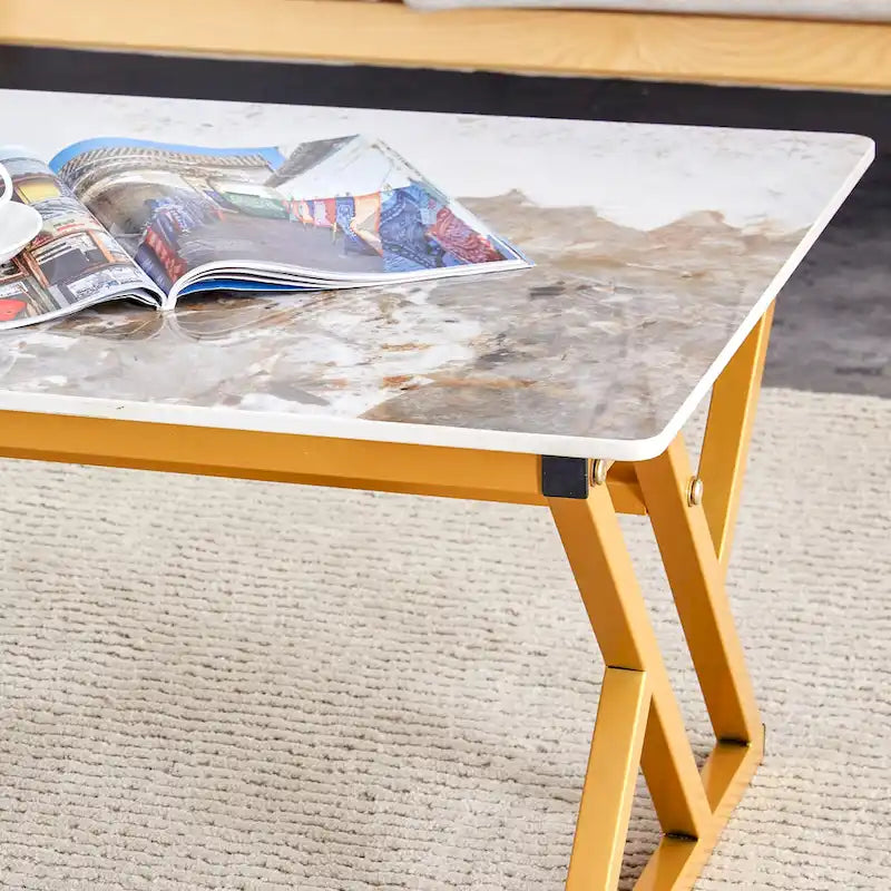 Table basse rectangulaire moderne 47 avec plateau en pierre frittée et pieds en métal en forme de X
